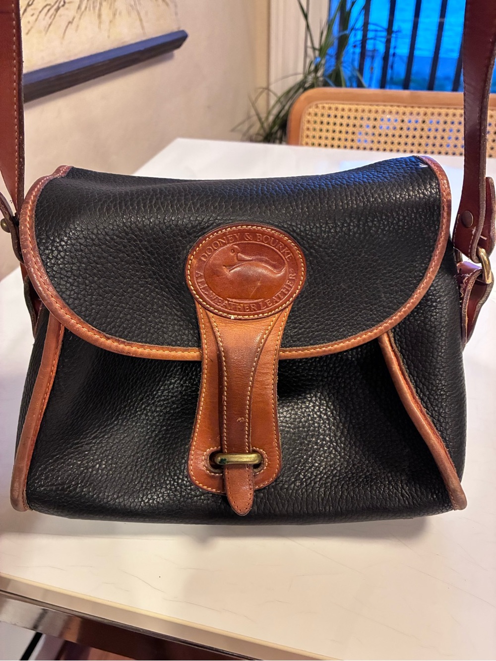 Dooney & Bourke Black Pebbled Leather Crossbody with Brown Trim